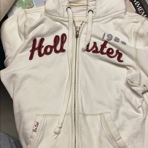 Cream colored hollister hooded zip up sweatshirt